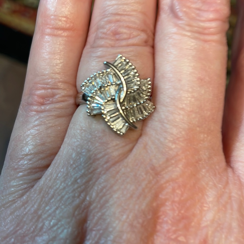 This is 925 sterling silver ring of all clear stones not diamonds.